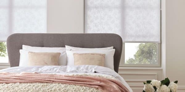 Roll Blinds in Translucent white fabric with Queen bed infront